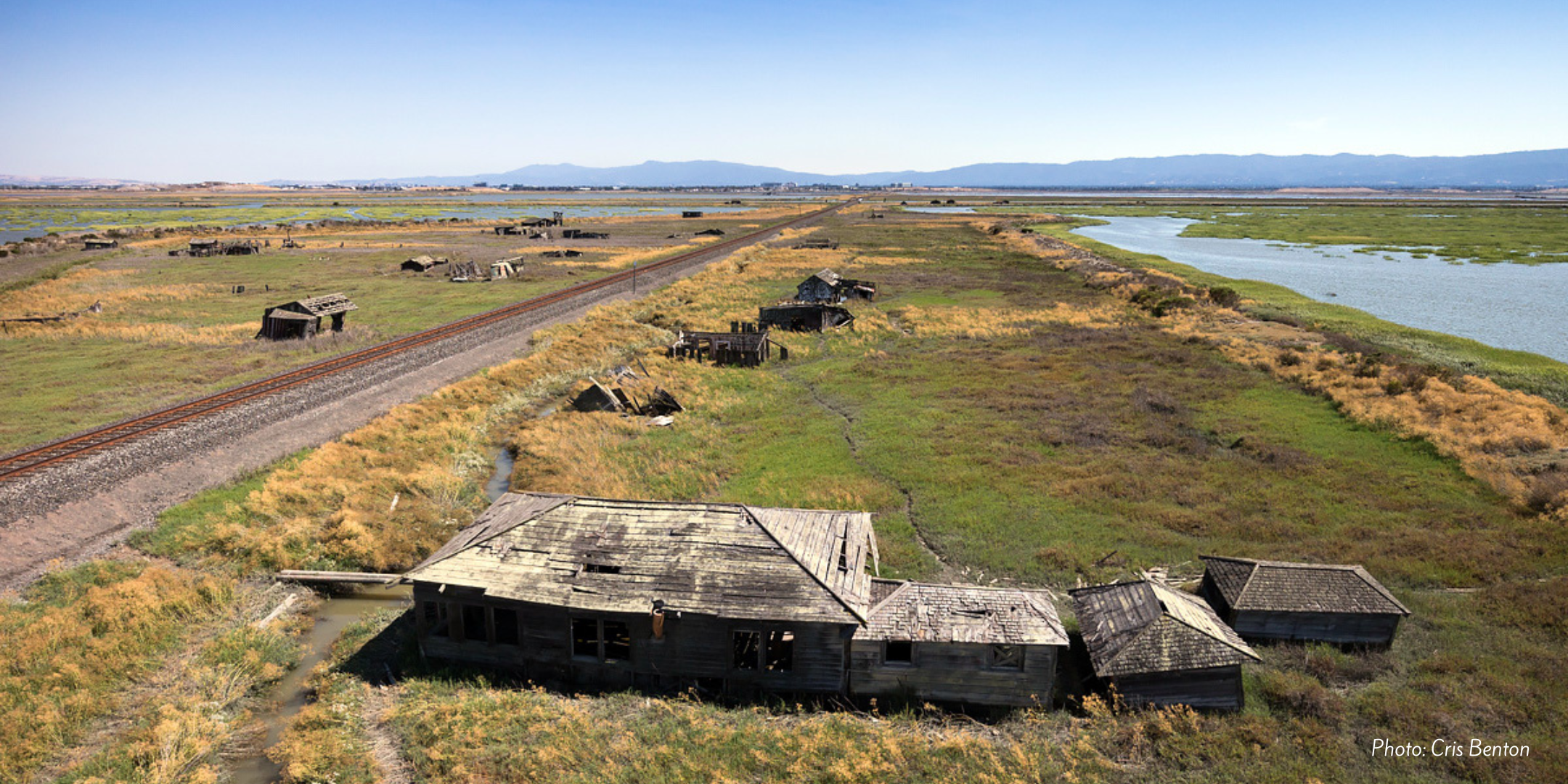 An overhead photo of Drawbridge. Old buildings are visible on the marsh.