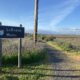 Trail entrance with a sign that reads LaRiviere Marsh.