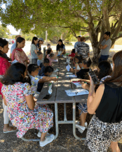 Participants making ice cream using salt.