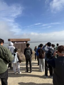 College students on a field trip learning about one of the salt ponds on the wildlife refuge.