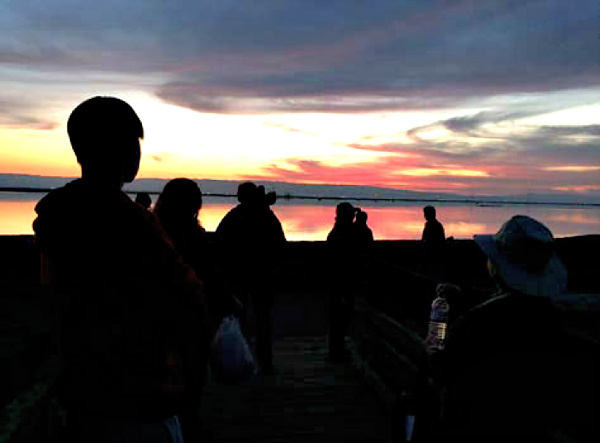 Volunteers Mary and Gene Bobik conduct a Twilight Marsh Walk at the Don Edwards San Francisco Bay National Wildlife Refuge. Photo courtesy Gene Bobik.